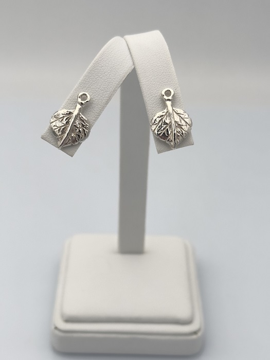 Leaf Stud Earrings In White Stand